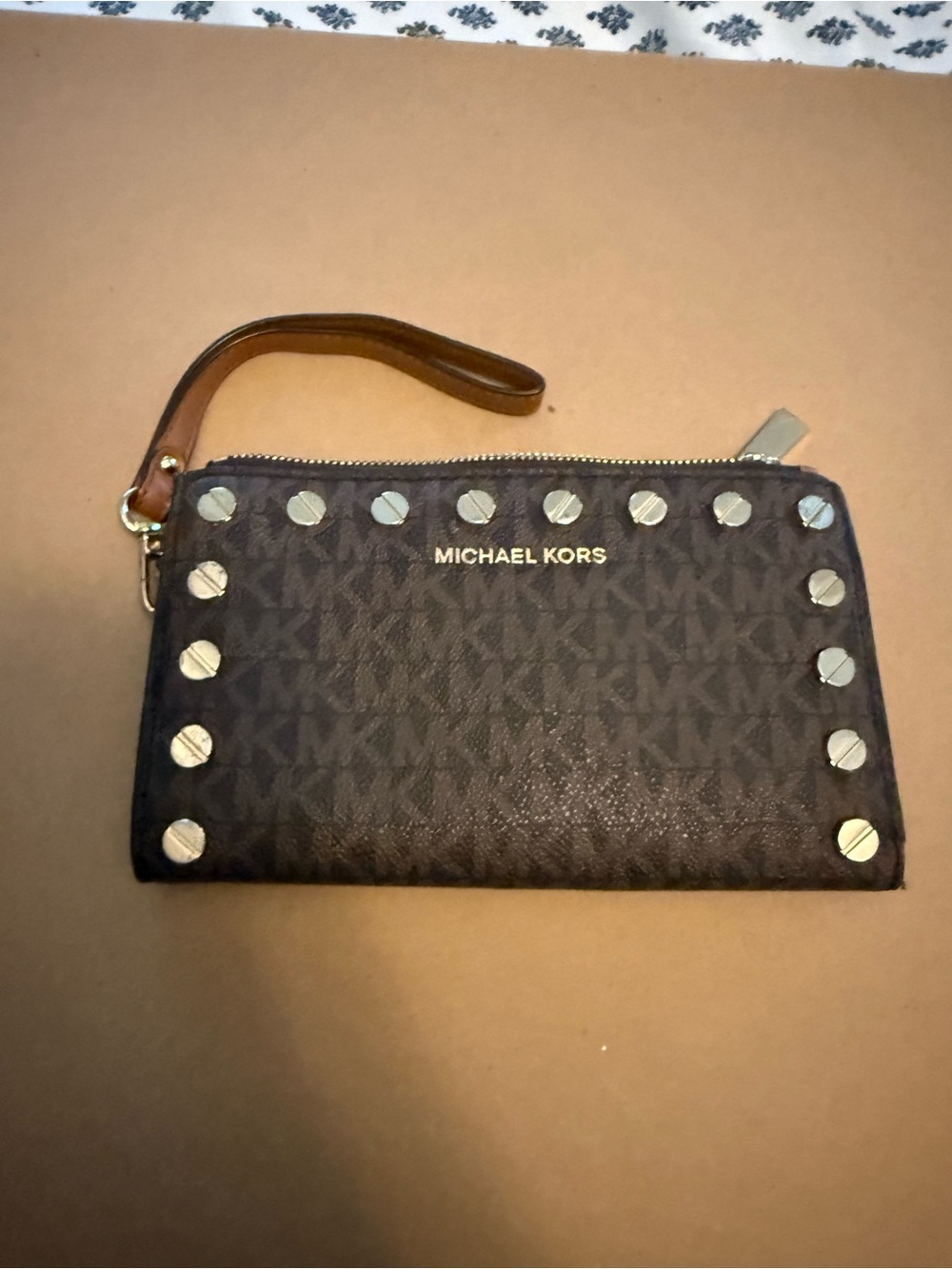 Michael Kors Dark Brown Monogram Wristlet with Gold Studs